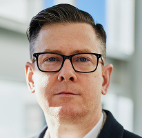 Alexander Hughes、暗号資産取引会社のCEOを務めるエグゼクティブ、ポートレート